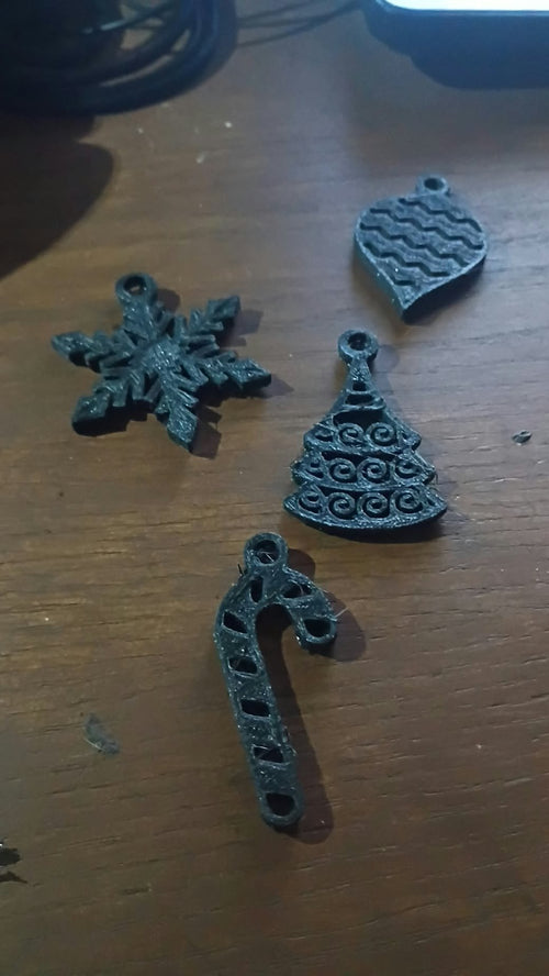 Set of four 3D printed Christmas ornaments: snowflake, tree, candy cane and bauble