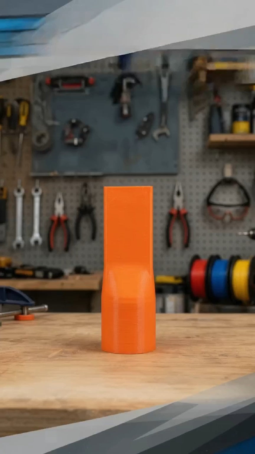 Orange 3D printed shop vacuum nozzle with 1.5 inch connector